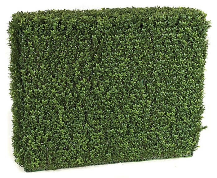 Artificial boxwood hedge panel with dense two-tone green foliage, photographed at an angle against a white background