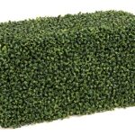 Rectangular artificial boxwood hedge block on a plain white background