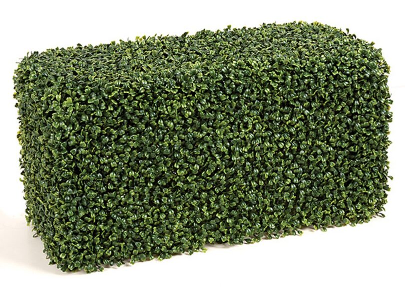 Rectangular artificial boxwood hedge block on a plain white background