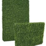 Two dense artificial hedge panels of small green leaves, one facing forward and one angled to show depth