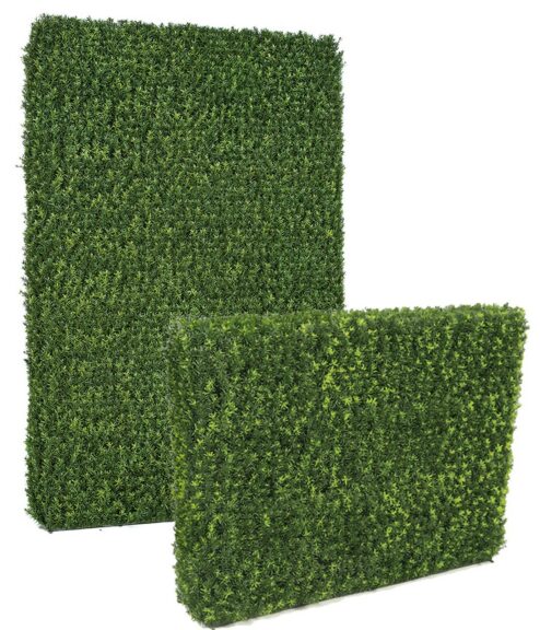 Two dense artificial hedge panels of small green leaves, one facing forward and one angled to show depth