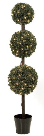 Three-ball pine topiary lit with warm white lights on a brown trunk, standing in a black plastic pot