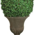 Artificial needle-point ivy ball with fine lacy leaves, displayed in a fluted urn planter