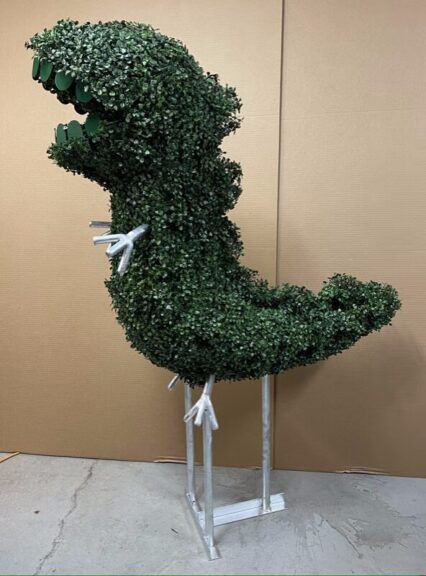 View of the T-Rex topiary on its galvanized leg armature and base frame