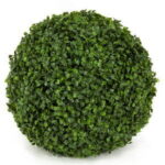 Artificial boxwood topiary ball with green leaves, studio photo