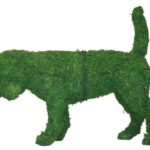 Moss-covered Beagle topiary in profile, long ears and raised tail