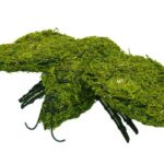 Moss-covered bumblebee topiary with dark wire legs, resting low with mossed wings visible