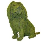 Moss-covered spaniel topiary sitting, ears down, with a visible wire-frame outline and one glass eye