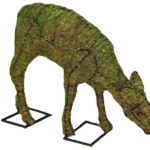 Moss-covered deer topiary in a grazing pose, head lowered, standing on two metal feet.
