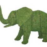 Moss-covered elephant topiary with raised trunk, tusks, and visible wire seams, on a white background.