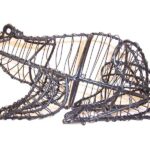 Bare wire-frame topiary sculpture of a frog, shown unfilled against a white background.