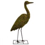 Mossed heron topiary with long neck and legs, standing on a metal base