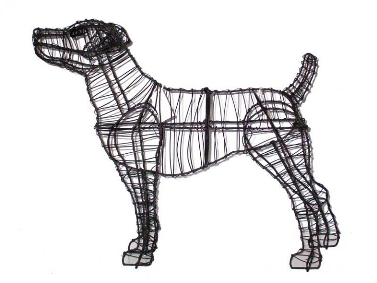 Bare black wire-frame terrier topiary, standing alert with ears up and tail raised, on a white background.