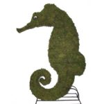 Moss-covered seahorse topiary with curled tail, mounted on a wave-shaped metal base