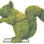 Moss-covered squirrel topiary on a wire frame, sitting upright with paws raised near its mouth