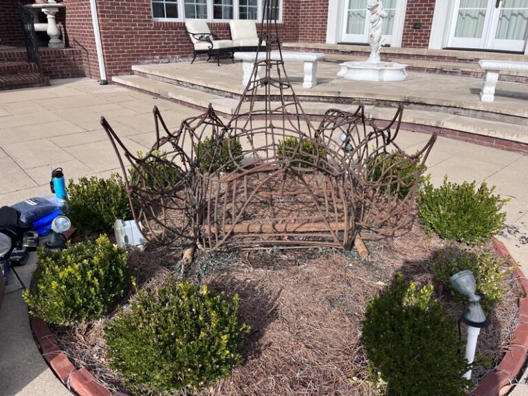 Swan topiary frame after stripping and galvanized metal spray, different angle
