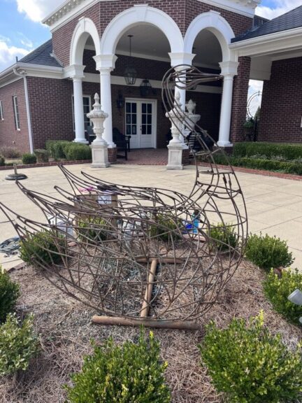 Swan topiary frame after stripping and galvanized metal spray, another angle