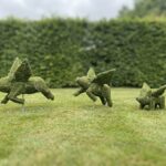 Flying Pigs Topiary, Moss Covered