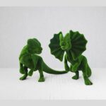 Two Green Moss Dinosaur Topiary Sculptures