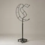 Monogram letter C topiary frame in Custom style, bare galvanized steel on an adjustable stand