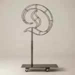Monogram letter D topiary frame in Custom style, bare galvanized steel on an adjustable stand