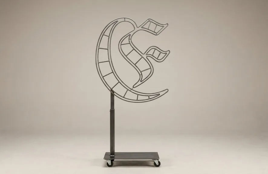 Monogram letter E topiary frame in Custom style, bare galvanized steel on an adjustable stand