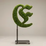 Monogram letter E topiary in Custom style, packed with green moss, on an adjustable stand