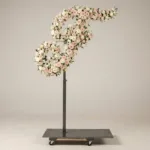 Monogram letter F topiary in script style, covered in pink and white roses