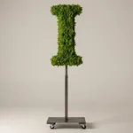 Monogram letter I topiary in Cinzel style, packed with green moss, on an adjustable stand