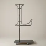Monogram letter L topiary frame in Cinzel style, bare galvanized steel on an adjustable stand