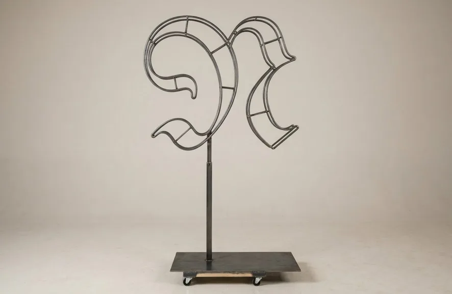 Monogram letter N topiary frame in Custom style, bare galvanized steel on an adjustable stand