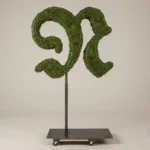 Monogram letter N topiary in Custom style, packed with green moss, on an adjustable stand