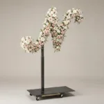 Monogram letter N topiary in script style, covered in pink and white roses