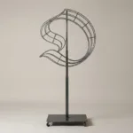 Monogram letter O topiary frame in Custom style, bare galvanized steel on an adjustable stand