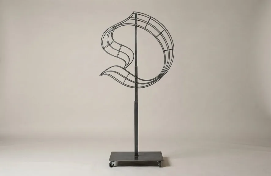 Monogram letter O topiary frame in Custom style, bare galvanized steel on an adjustable stand