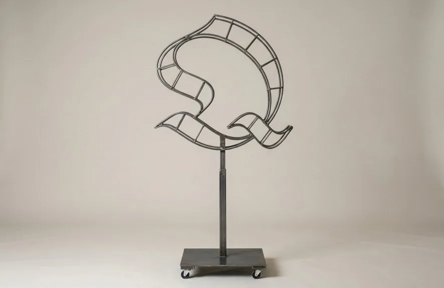 Monogram letter Q topiary frame in Custom style, bare galvanized steel on an adjustable stand