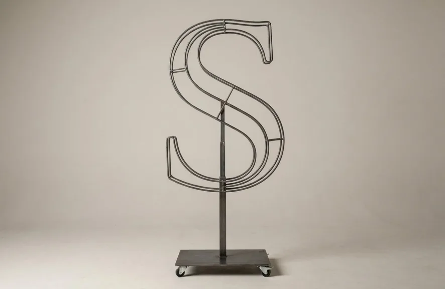 Monogram letter S topiary frame in Cinzel style, bare galvanized steel on an adjustable stand