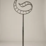 Monogram letter S topiary frame in Custom style, bare galvanized steel on an adjustable stand