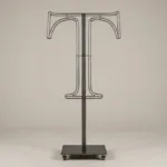 Monogram letter T topiary frame in Roman style, bare galvanized steel on an adjustable stand