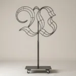 Monogram letter W topiary frame in Custom style, bare galvanized steel on an adjustable stand