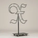 Monogram letter X topiary frame in Custom style, bare galvanized steel on an adjustable stand