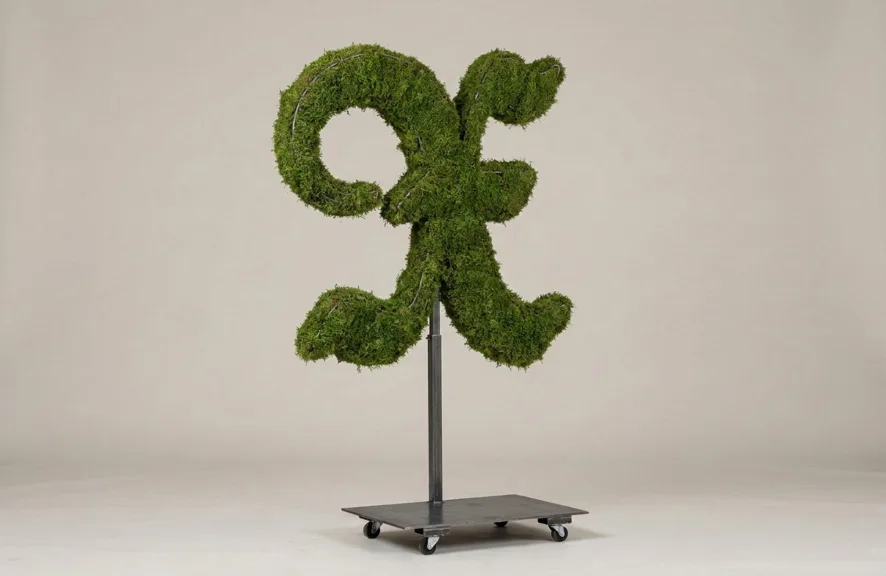 Monogram letter X topiary in Custom style, packed with green moss, on an adjustable stand