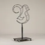 Monogram letter Y topiary frame in Custom style, bare galvanized steel on an adjustable stand