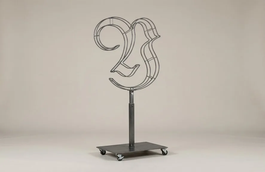 Monogram letter Y topiary frame in Custom style, bare galvanized steel on an adjustable stand
