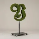 Monogram letter Y topiary in Custom style, packed with green moss, on an adjustable stand