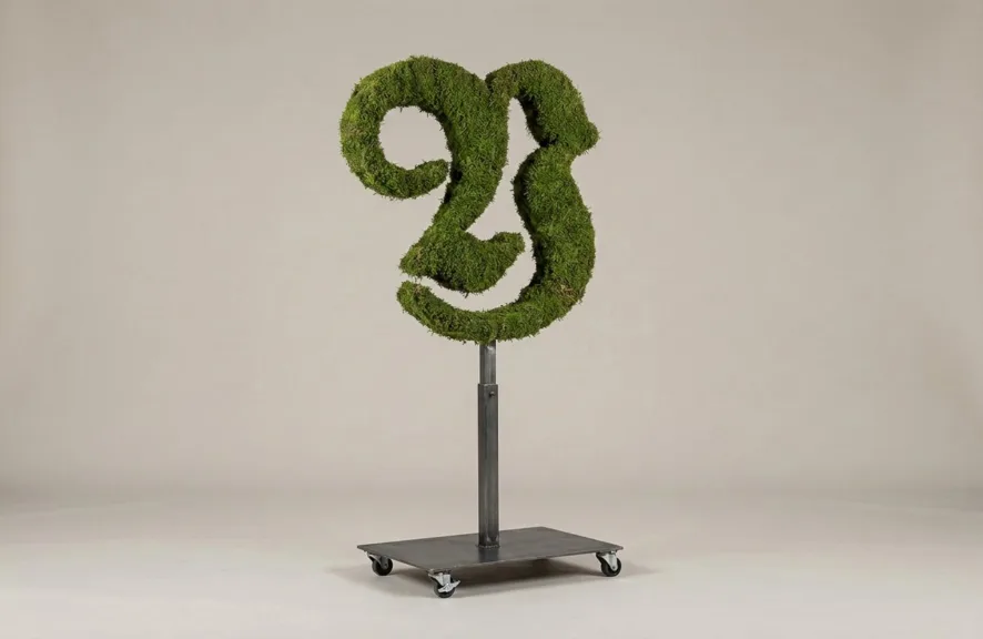 Monogram letter Y topiary in Custom style, packed with green moss, on an adjustable stand