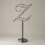 Monogram letter Z topiary frame in Script style, bare galvanized steel on an adjustable stand