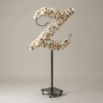 Monogram letter Z topiary in script style, covered in pink and white roses